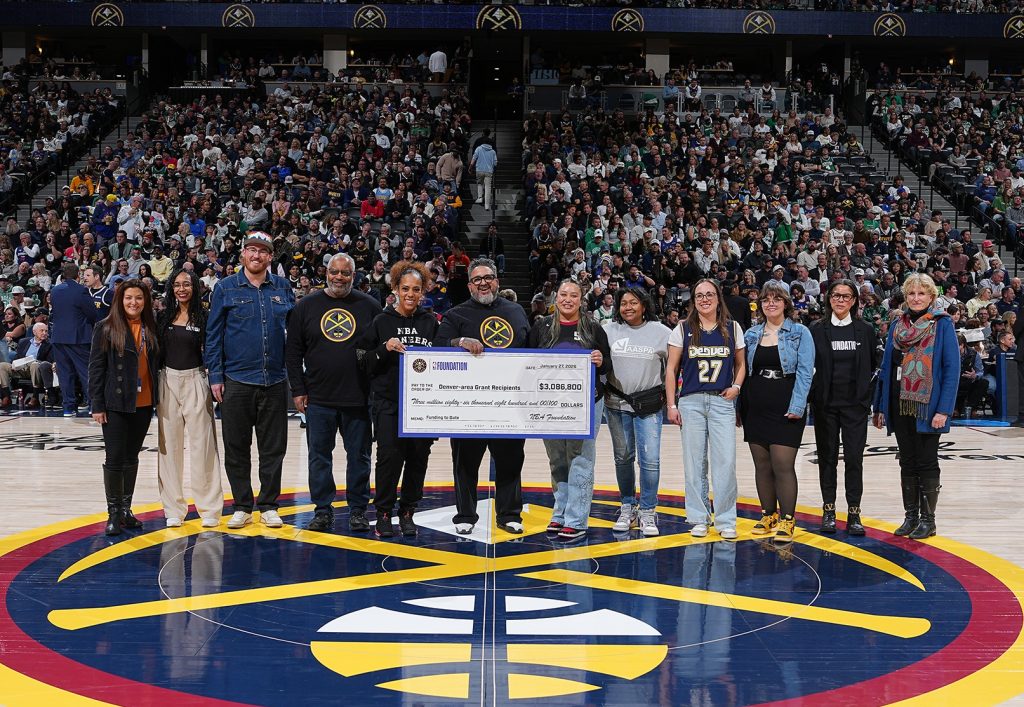 Denver organizations check presentation at the Denver Nuggets game in Ball Arena