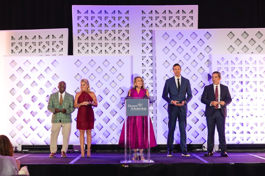 (Accepting their awards on behalf of our partners from left to right Dr. Nate Easley, Neisa Lynch, Danny Wetmore, and Don Daboub presented by Lorii Rabinowitz in the podium) 