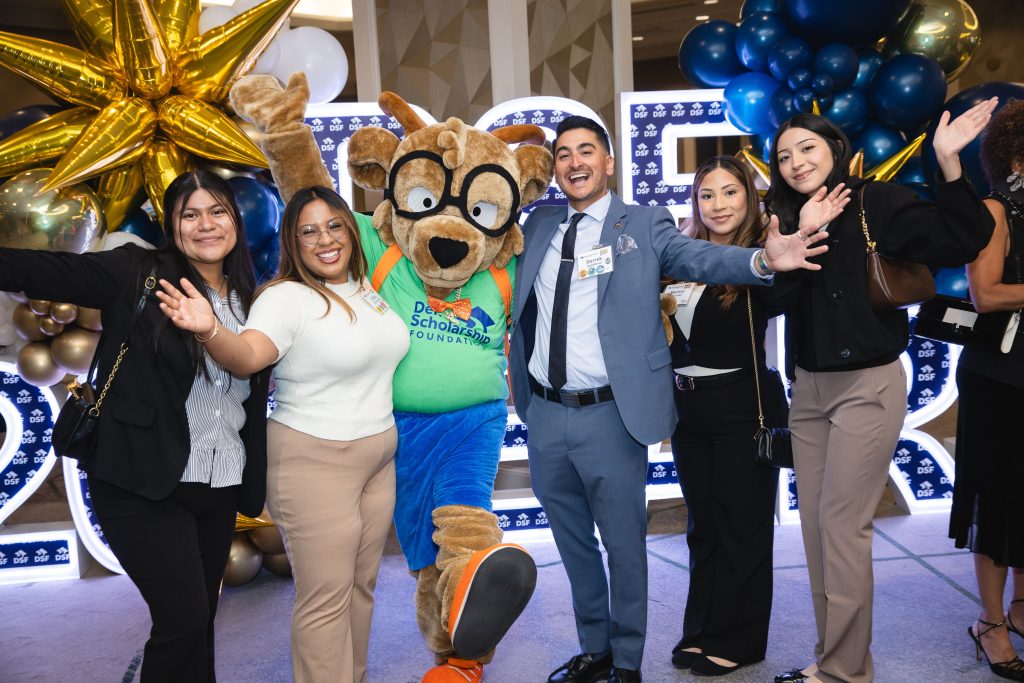 DSF Scholars and Alumni posing with DSF Mascot Future