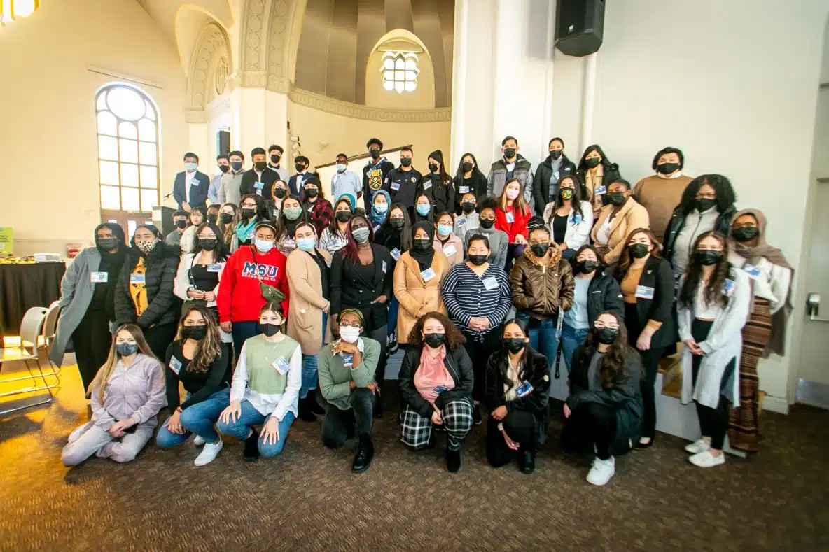 Students posing inside