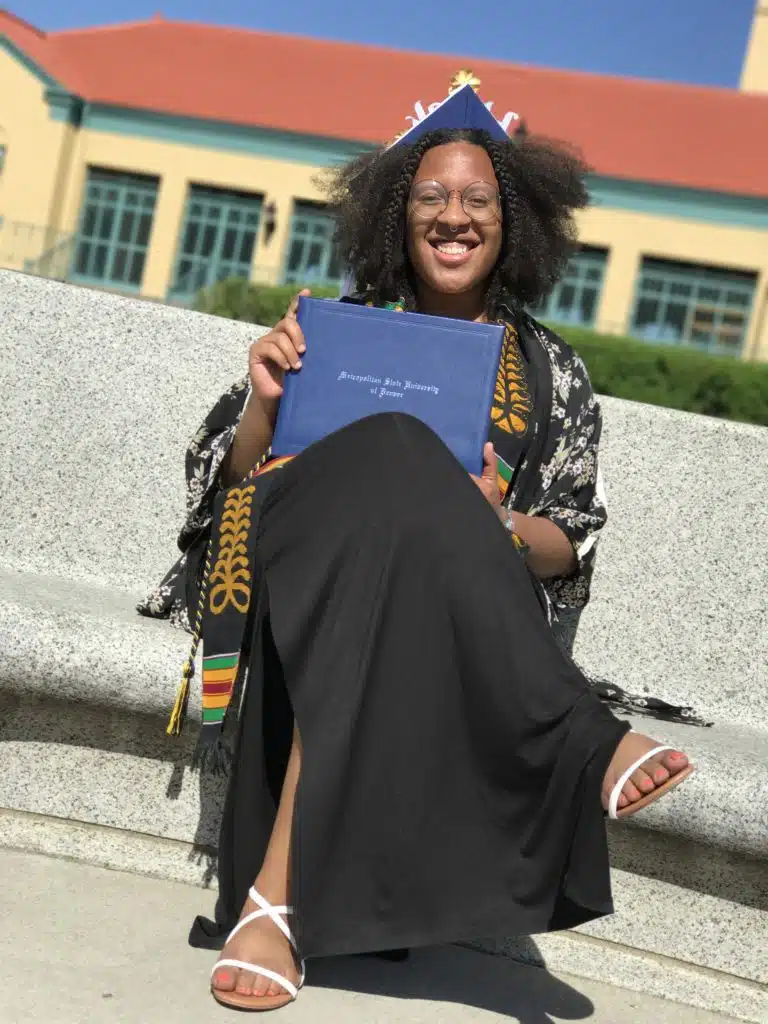 DSF Alum Yazmin Atmore Graduation holding her diploma