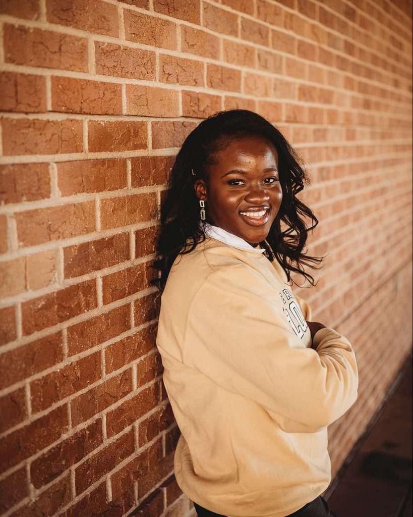 Tamara Curry smiling looking into the camera