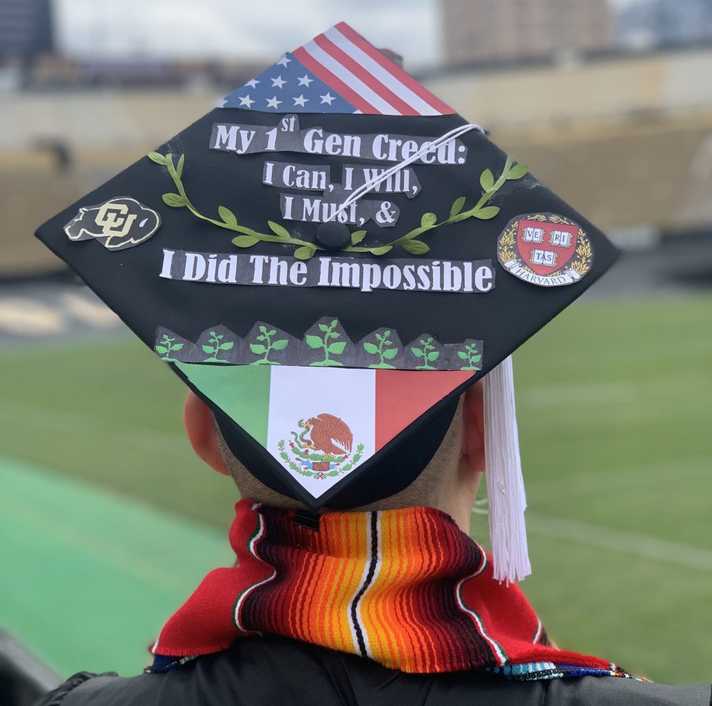 Santos decorated cap from CU Boulder featuring U.S. and Mexican flag, celebrating cultural pride and academic achievement.