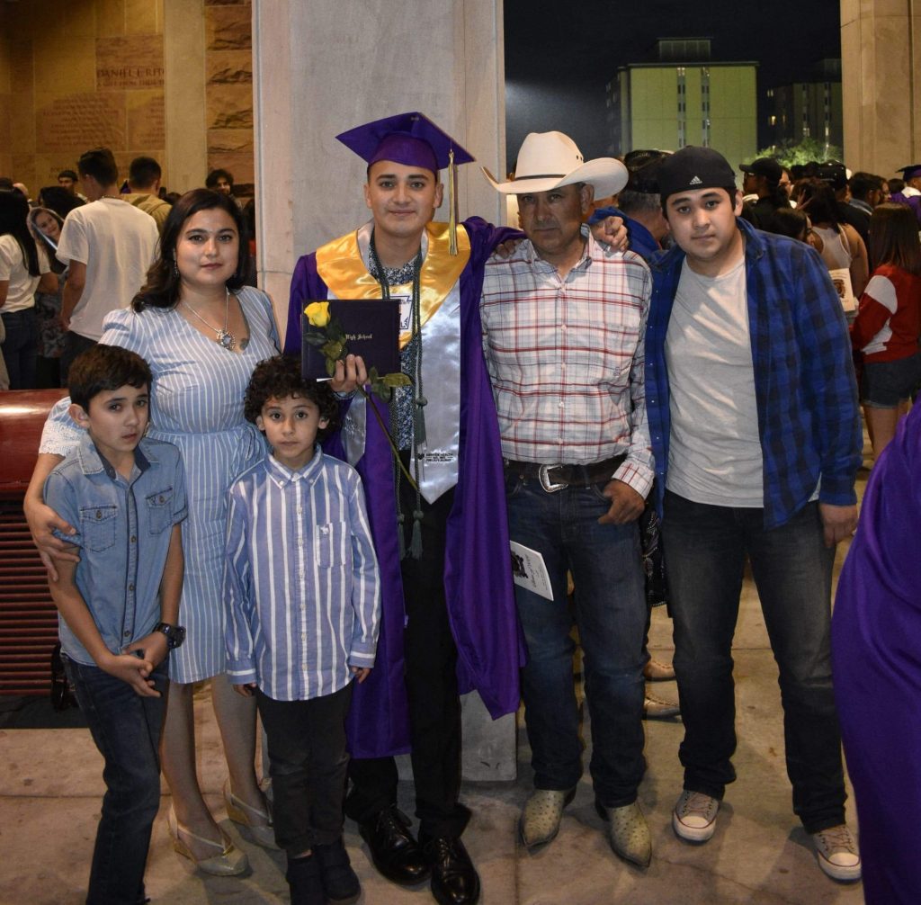 Diego with his family at his North High School graduation.
