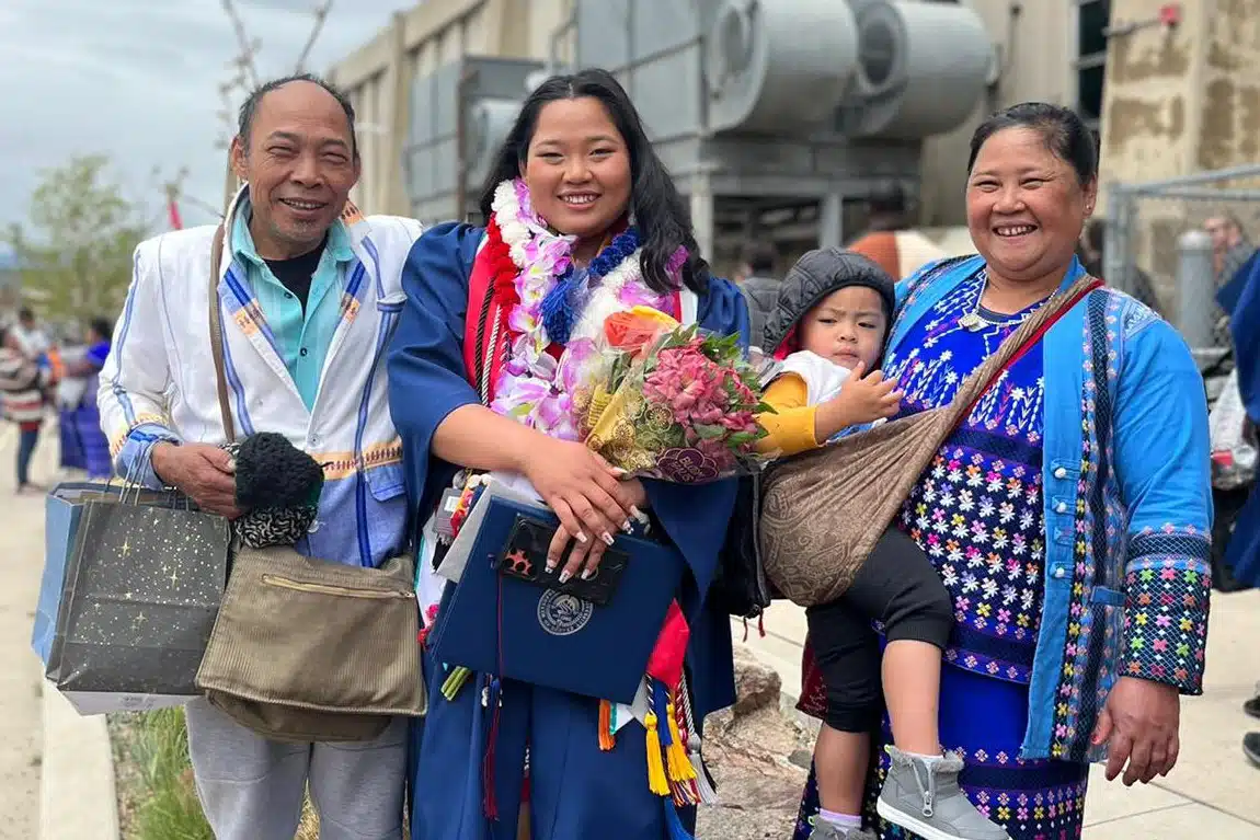 DSF Scholar Redar Moo in graduation robes with her family